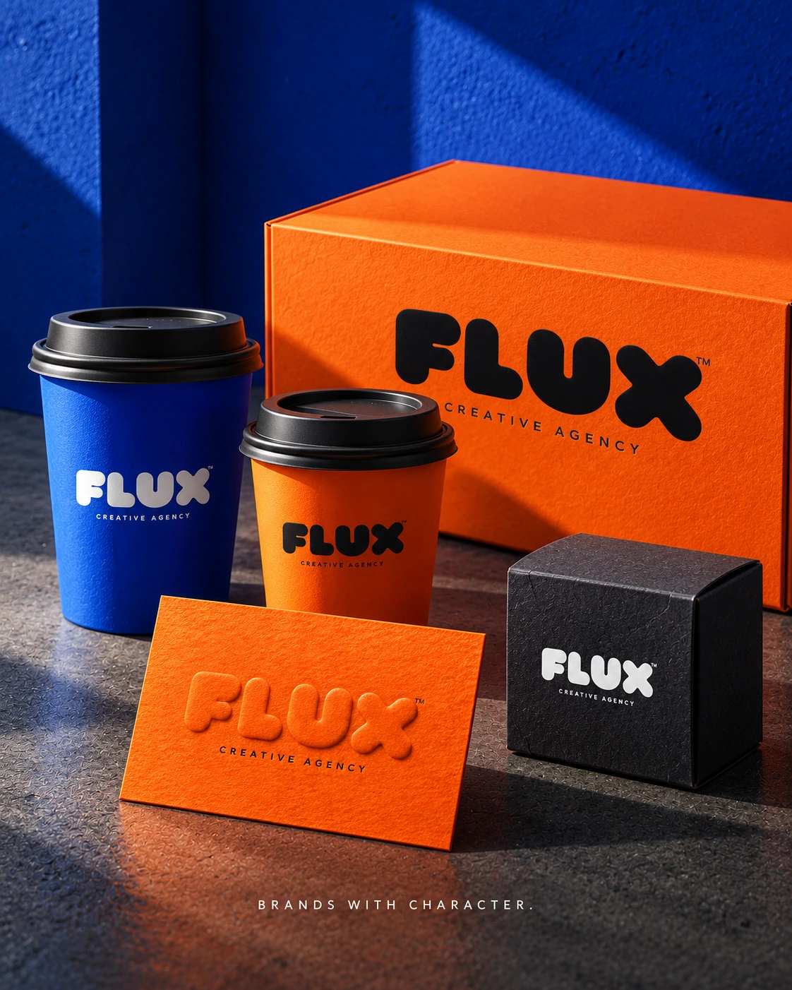 Flux branded orange and blue coffee cups, boxes and embossed card