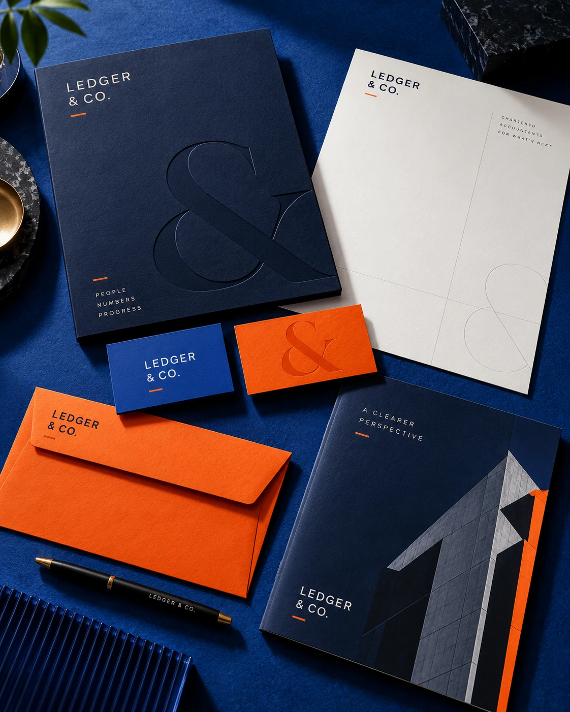 Ledger & Co navy, blue and orange branded stationery